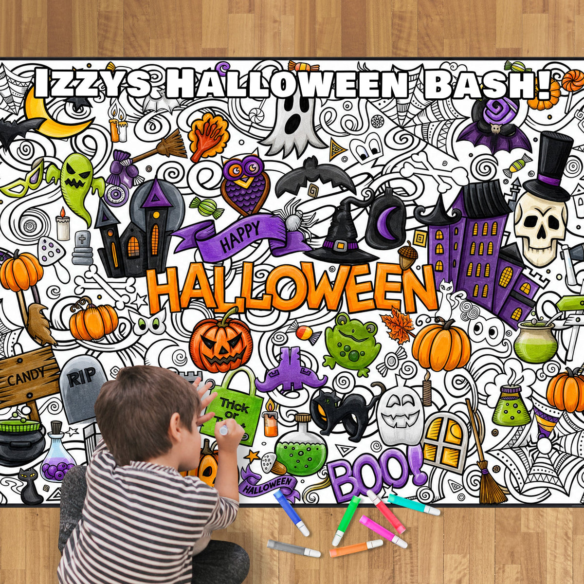 A child sits on the floor coloring a giant personalized coloring poster with markers.  The poster features Halloween-themed graphics of objects and words.