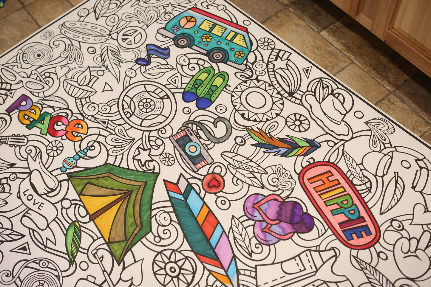 Coloring book page with various illustrations and text on a floor.