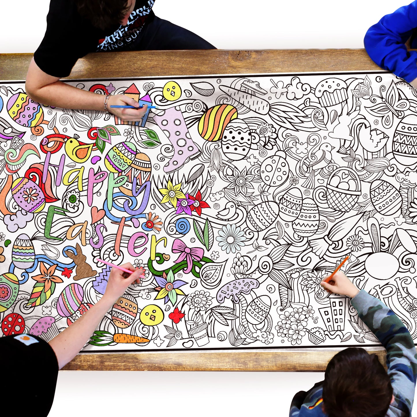 4 boys sitting at a table coloring an easter coloring banner