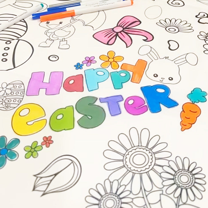 Coloring fabric coloring tablecloth with 'Happy Easter' text and Easter-themed illustrations colored in bright colors on a white background.